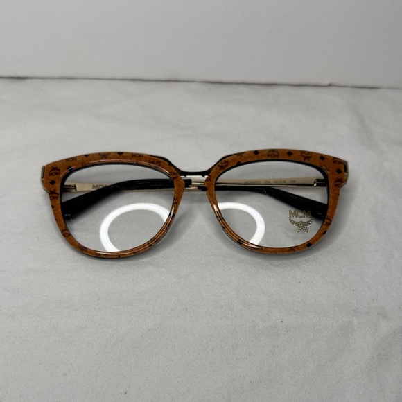 MCM Gold Textured Accessory - Picture 3 of 16